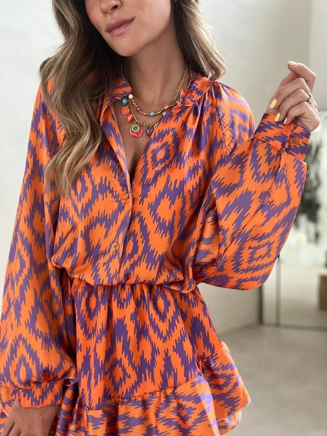 Eira Dress | Long Sleeve Ruffled Hem Mini Dress