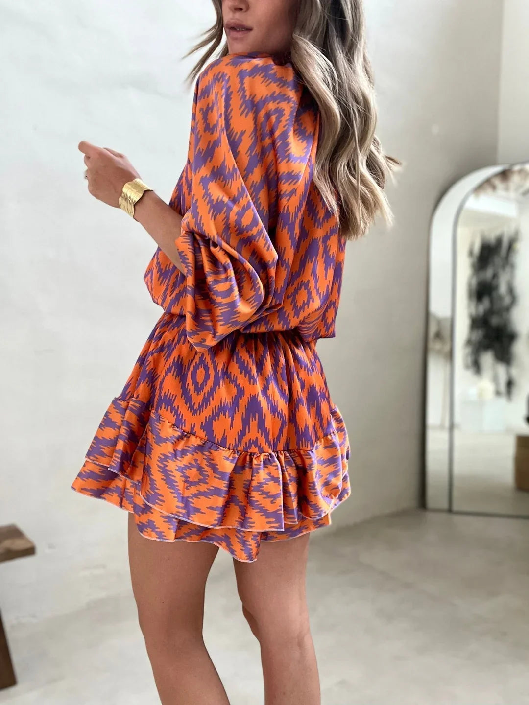 Eira Dress | Long Sleeve Ruffled Hem Mini Dress